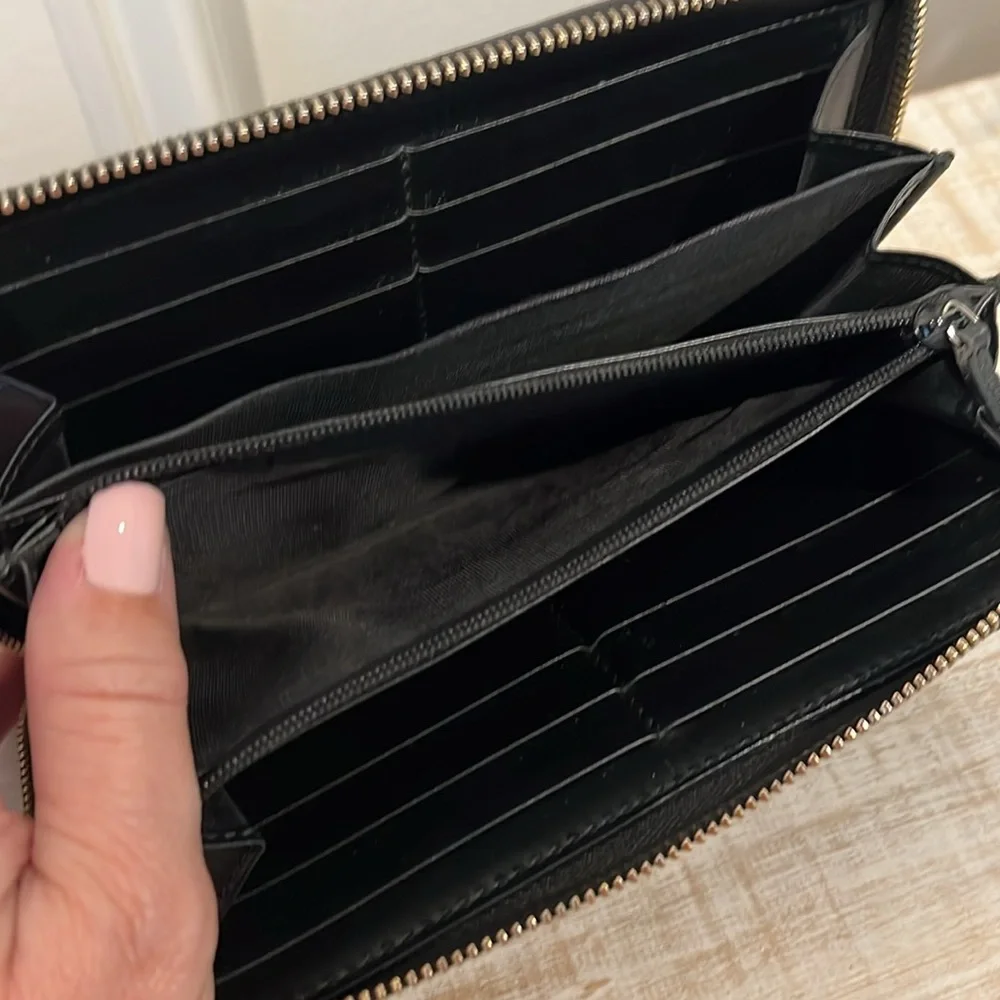 Gucci Black Embossed GG Leather Zip Wallet with Gold Tone Accent